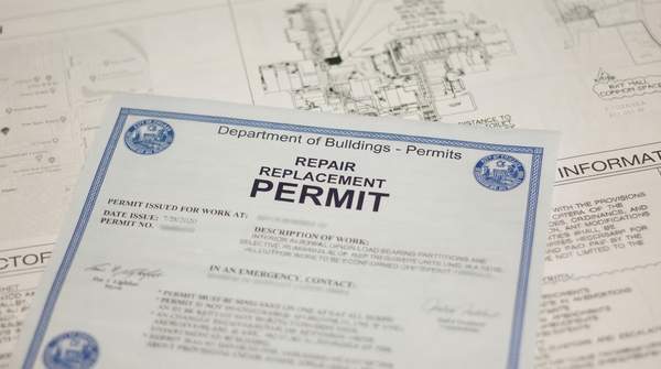 Editorial illustration for Does Your Chicago Renovation Need a Building Permit? A Homeowner's Decision Guide
