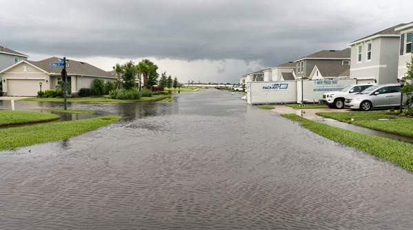 Editorial illustration for Protecting Your Home from Flooding: A Guide to Mitigation and Insurance Savings
